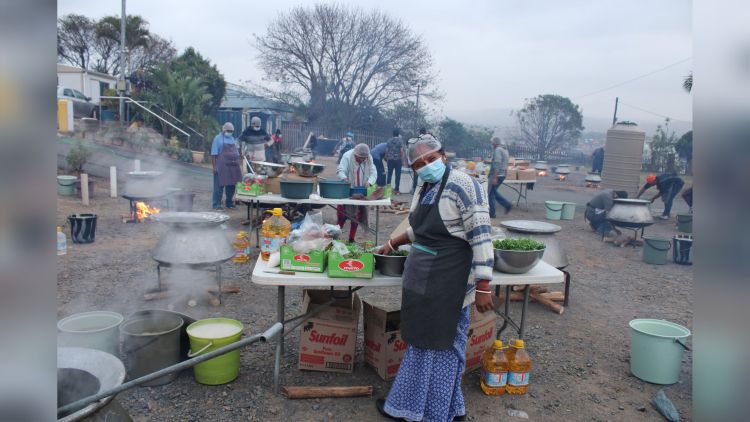 A devotee prepares vegetables